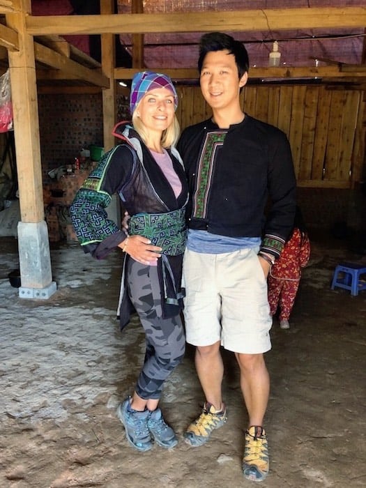 couple dressed in traditional black Hmong clothing