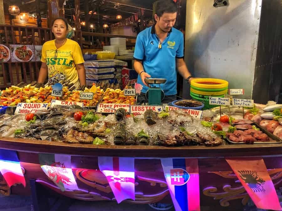 Image of a restaurant front in Thailand showing off fresh seafood