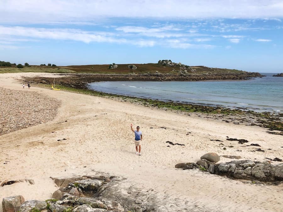 Jeff walks on the sand bar that separates two small islands