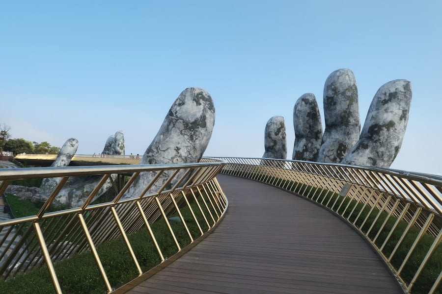 Image of the Golden Bridge Vietnam without people on it, giant stone hands holding a golden walking bridge