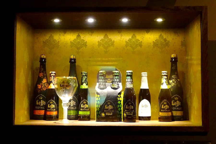 A display of various Leffe branded beers at the Maison Leffe Museum in Dinant