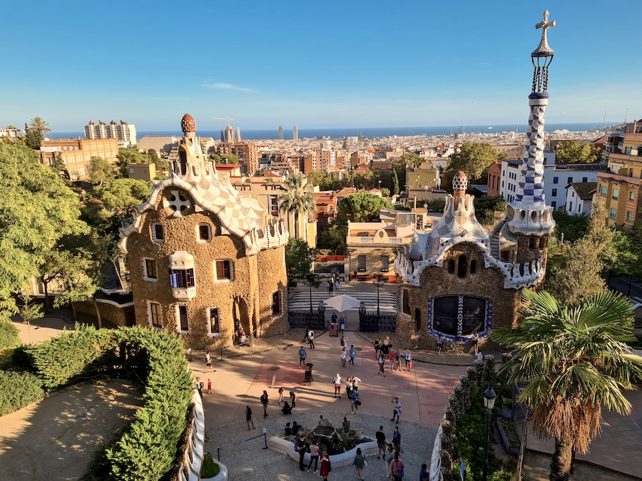 Image of Park Guell in Barcelona a colouful tiled park with towers