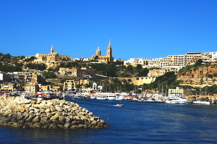 Gozo ferry terminal in Malta with the church visible in the distance