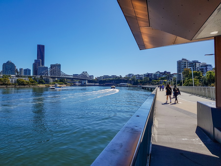 New Farm River Walk scene with a peaceful riverside path, greenery, and scenic views along the water.