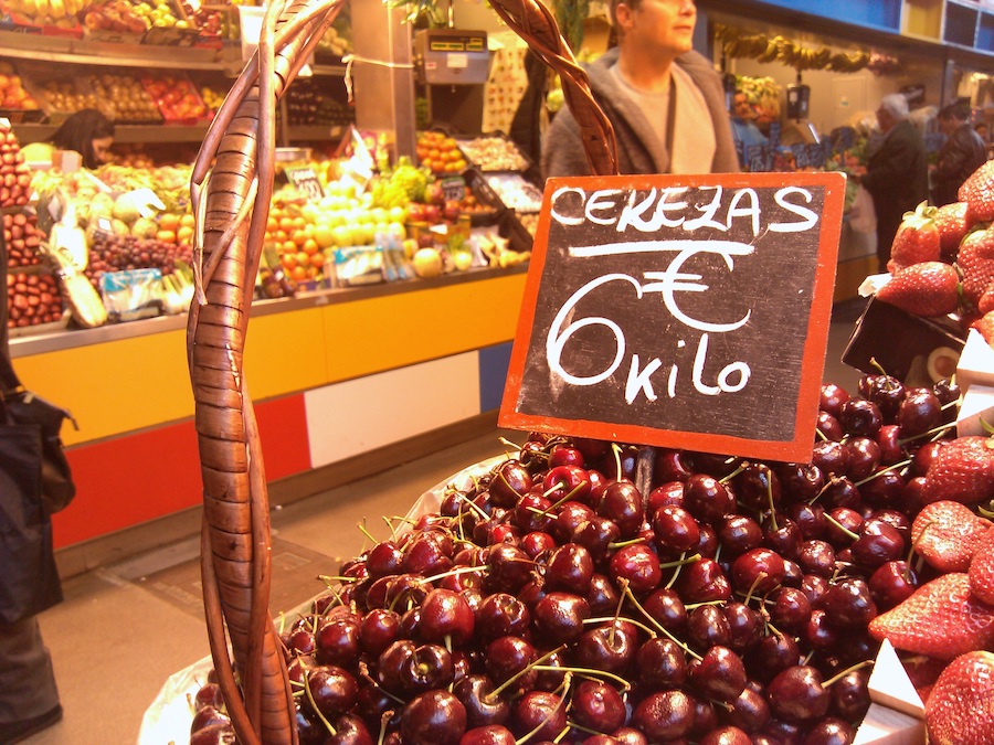 market stall showing a big pile of cherries