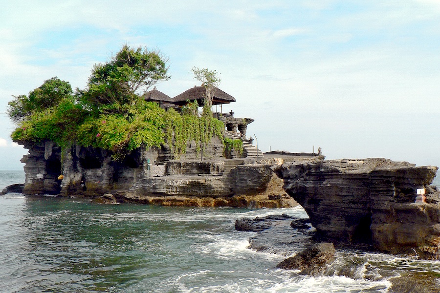 The temple of Tanah Lot in Bali, a small temple on its own island surrounded by the sea