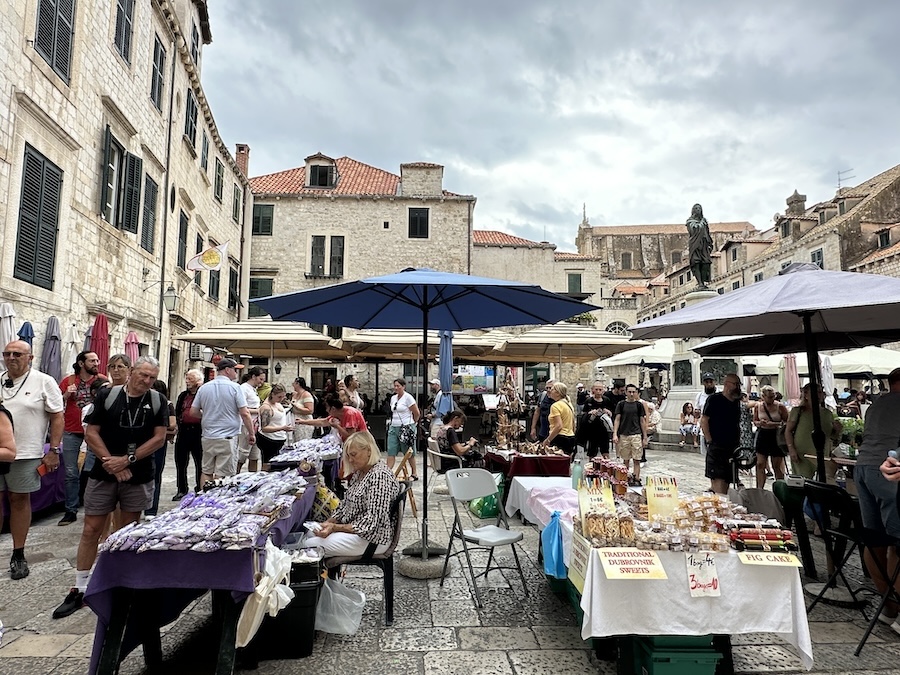 Gundulić Square market Dubrovnik with local stalls and Old Town buildings