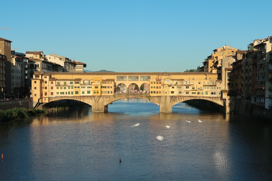 View of Ponte Vecchio bridge across the Arno River in Florence