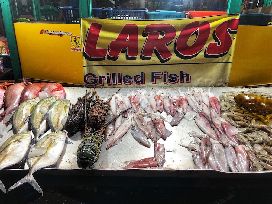 Fresh seafood on display at the Labuan Bajo fish market in Flores, Indonesia